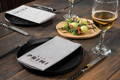 Premium custom printed napkins at a restaurant setting